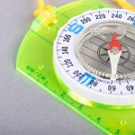 YELLOW SCHOOL THUMB COMPASS WITH STRAP